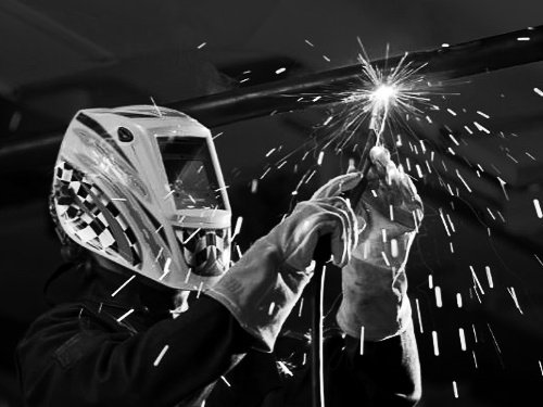 The versatility of MIG welding allows work in any position. (Miller Electric Mfg. Co.)